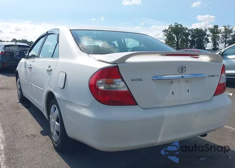 2002 Toyota Camry Le from USA, damaged, VIN 4T1BE32K62U063797